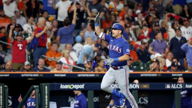 Oct 23, 2023; Houston, Texas, USA; Texas Rangers first baseman Nathaniel Lowe (30) reacts after hitting a two-run home run during the sixth inning of game seven in the ALCS against the Houston Astros for the 2023 MLB playoffs at Minute Maid Park. Mandatory Credit: Thomas Shea-USA TODAY Sports  